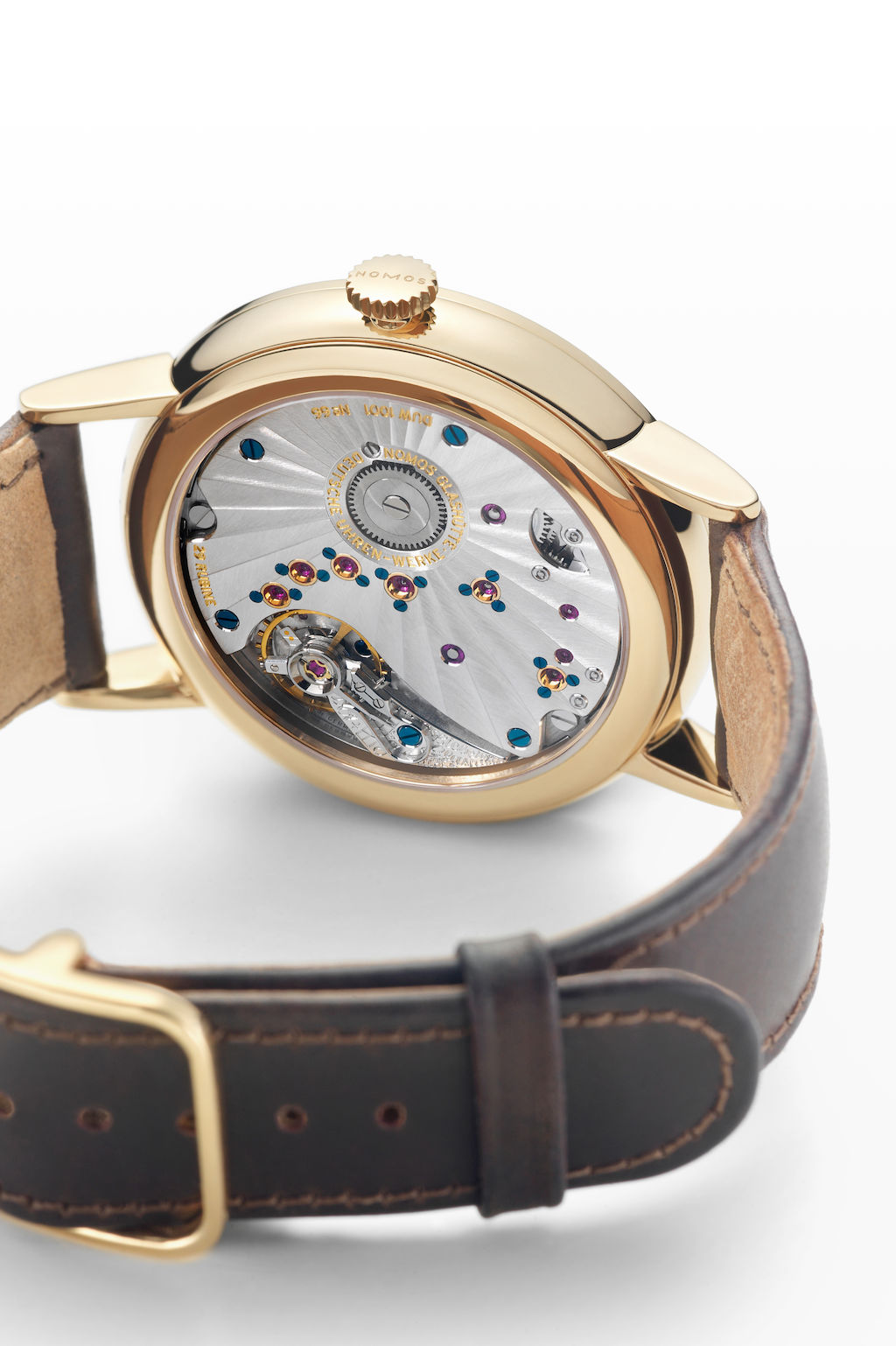 Nomos gold watch hotsell